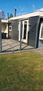 Glazen windscherm met aluminium staanders., Ophalen