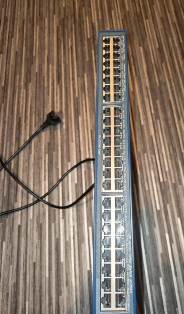 HP JE069A netwerk Switch met 48 poorten, Computers en Software, Netwerk switches, Gebruikt, Ophalen of Verzenden