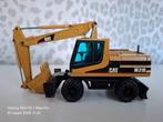 Caterpillar M318 Mobielekraan, Hobby en Vrije tijd, Modelauto's | 1:50, Ophalen of Verzenden, Zo goed als nieuw, Bus of Vrachtwagen