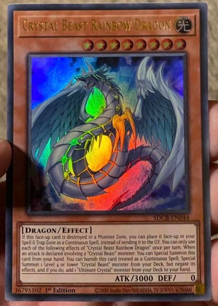 Yu-Gi-Oh! Crystal Beast Rainbow Dragon SDCB 1st Edition !, Ophalen of Verzenden, Zo goed als nieuw, Losse kaart, Foil