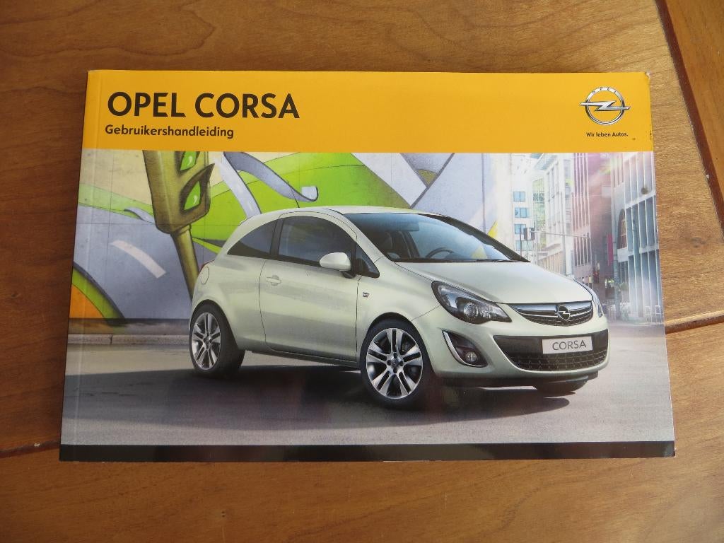 Instructieboek Opel Corsa 2012 + handleiding audio/navigatie, Ophalen of Verzenden