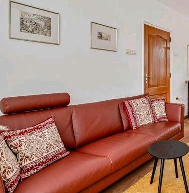 LEOLUX bank met elektrische luchtkamers - roestbruin, Huis en Inrichting, Banken | Bankstellen, Gebruikt, Rechte bank, Driepersoons