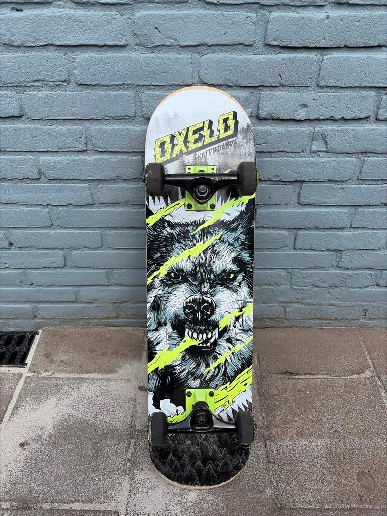 Oxelo Skateboard met stoere wolf print, Sport en Fitness, Skateboarden, Ophalen of Verzenden, Gebruikt, Skateboard