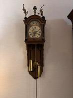 Antieke Friese Staartklok met Atlas en Bazuinblazers, Ophalen