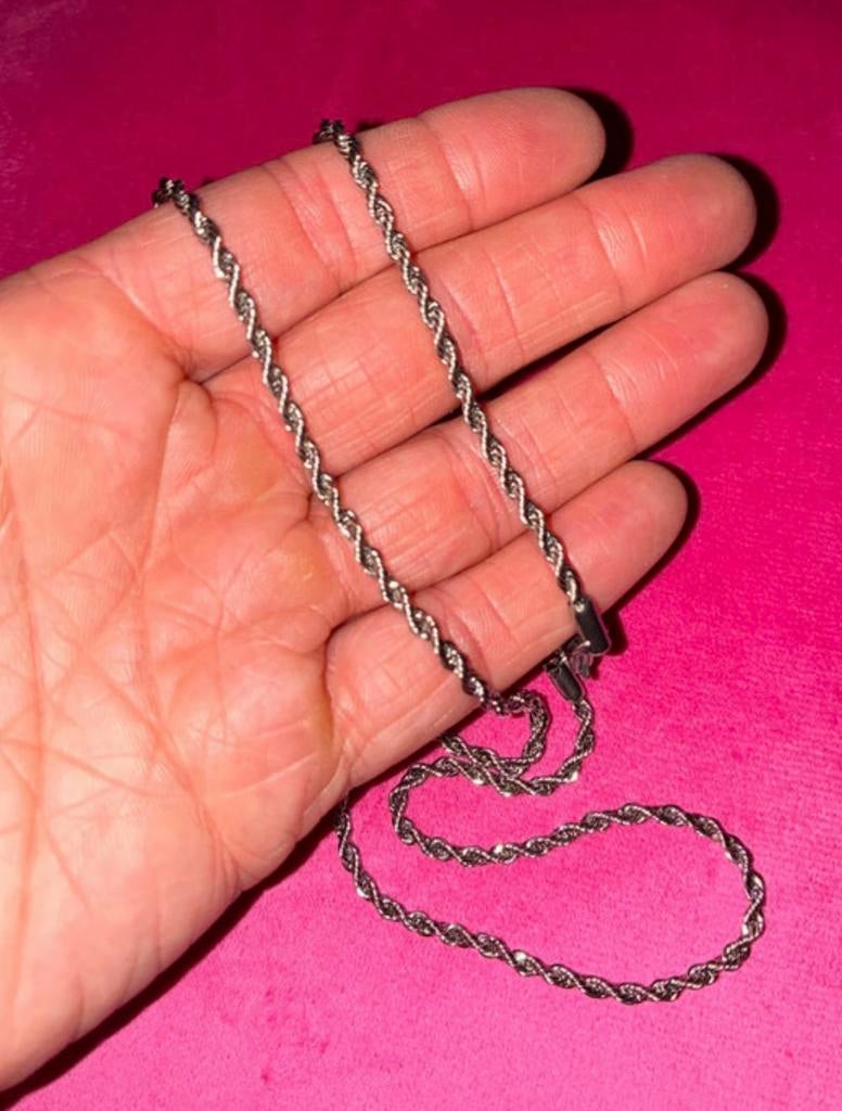 Nieuwe zilverkleurige ketting 60 cm. Stainless steel., Sieraden, Tassen en Uiterlijk, Kettingen, Ophalen of Verzenden, Nieuw, Zilver