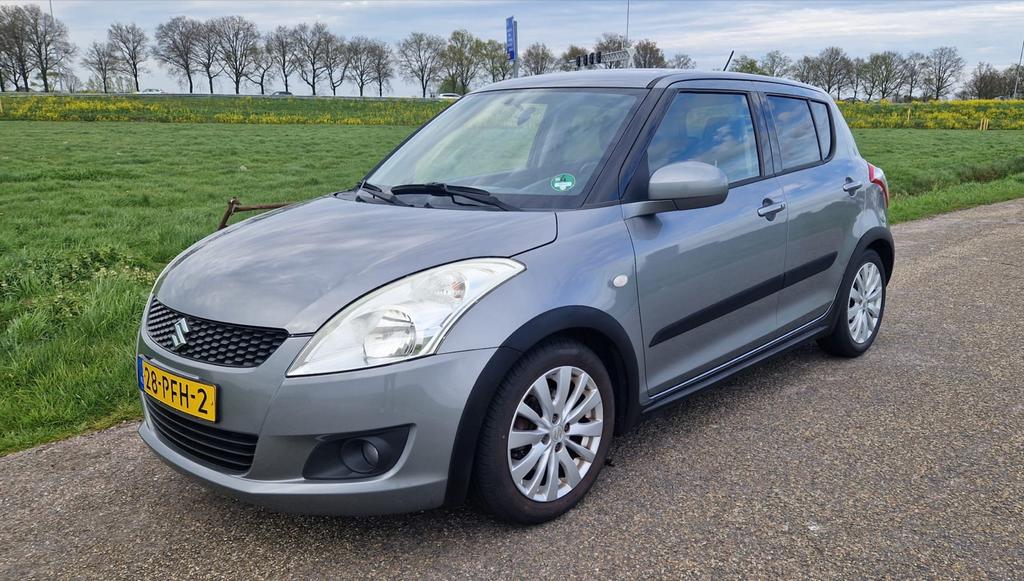 Suzuki Swift 1.2 5-D 2011 Grijs (DEALER ONDHOUDEN), Auto's, Voorwielaandrijving, Stof, 4 cilinders, 400 kg