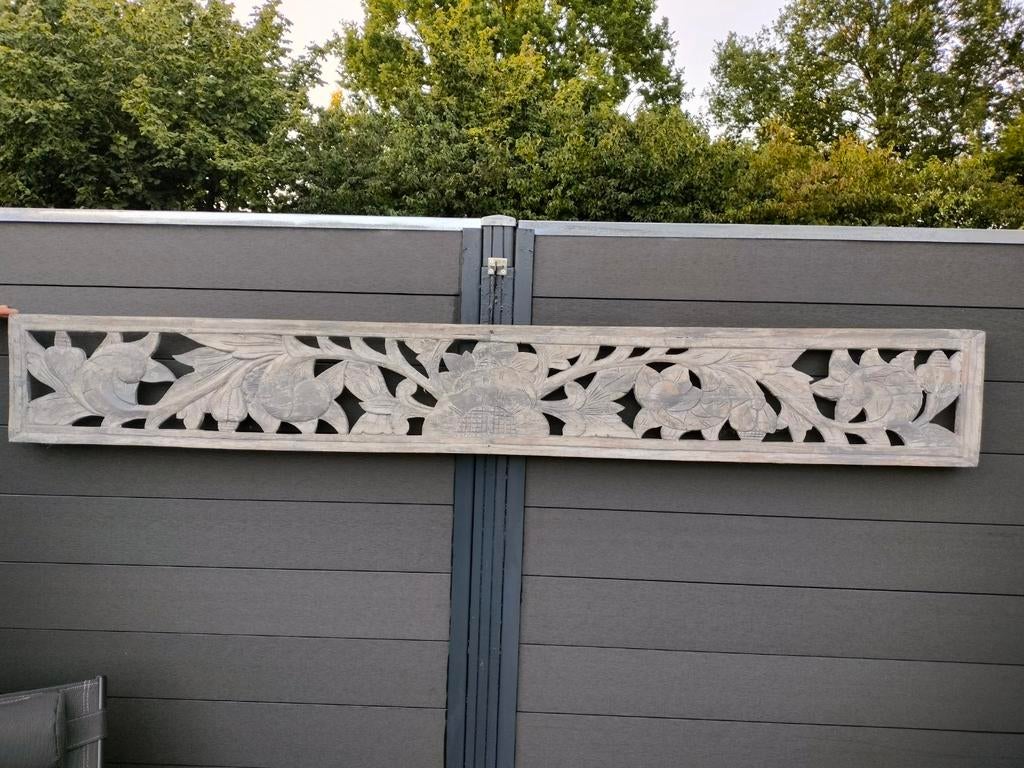 Handgesneden houten paneel India, Ophalen