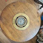 Ronde tafel met antiek ingebouwd scheepskompas, Ophalen