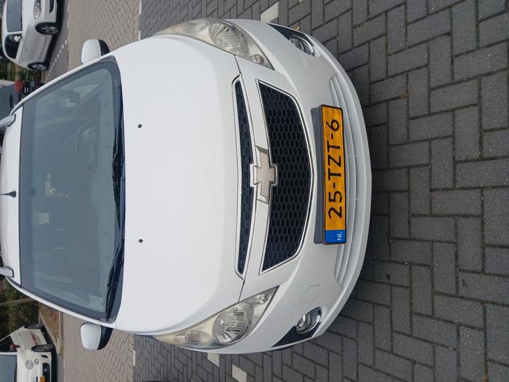 Goed rijdende Chevrolet Spark 1.0 Bifuel 2012 Wit., Auto's, Chevrolet, Particulier, Spark, Airbags, Centrale vergrendeling, Dakrails