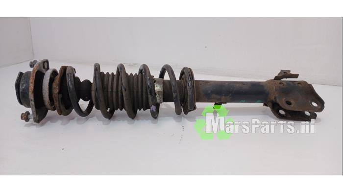 Schokdemper rechts-voor van een Daihatsu Cuore, Auto-onderdelen, Ophanging en Onderstel, Daihatsu, Gebruikt, 3 maanden garantie