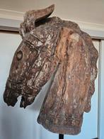 Houten paardenhoofd, Ophalen