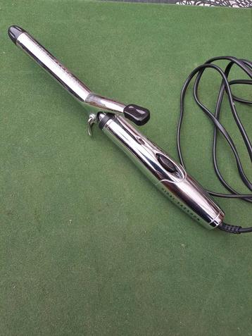 te koop een krul tang    nooit gebruikt geweest  beschikbaar voor biedingen