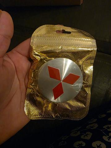 Naafdoppen set Mitsubishi origineel rood zilver wiel band beschikbaar voor biedingen