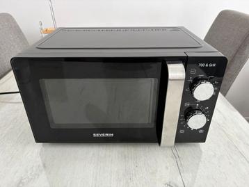 NIEUW Kleine Magnetron - Zwart - Nooit Gebruikt Grillfunctie beschikbaar voor biedingen