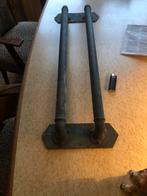 Oude koperen deurgreep, Ophalen