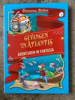 Geronimo Stilton - Gevangen in Atlantis, Boeken, Fantasy, Ophalen of Verzenden, Zo goed als nieuw