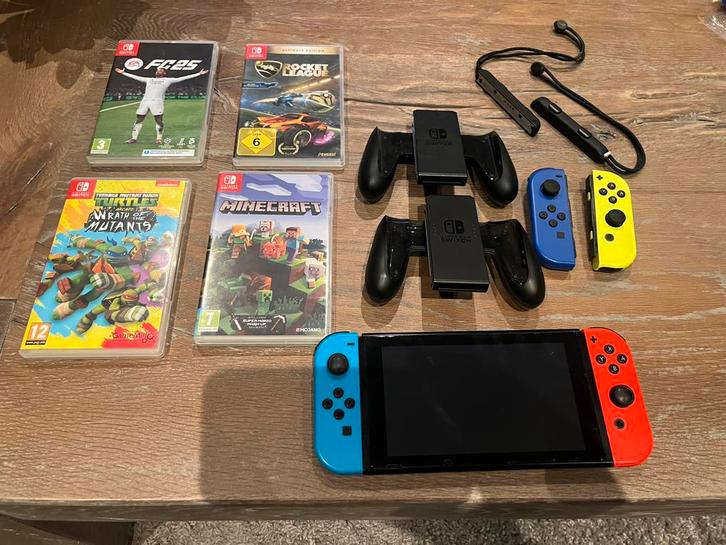 Nintendo Switch + 9 spellen, Spelcomputers en Games, Spelcomputers | Nintendo Switch, Gebruikt, Switch 2019 Upgrade, Met 3 controllers of meer
