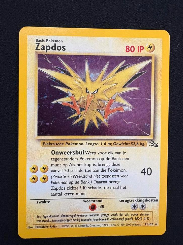Zapdos (UNLIMITED) 15/62 Fossil NL NM, Hobby en Vrije tijd, Verzamelkaartspellen | Pokémon, Nieuw, Losse kaart, Foil, Ophalen of Verzenden