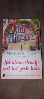 Het kleine straatje met het grote hart - Manuela Inusa, Ophalen of Verzenden, Zo goed als nieuw, Manuela Inusa, Nederland