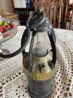 Mijnwerkerslamp, Ophalen