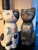 Houten Katten beelden, Ophalen