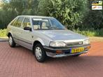 Mazda 323 1.3 LX Automaat/Nap, Auto's, Mazda, Gebruikt, 4 cilinders, 400 kg, Origineel Nederlands