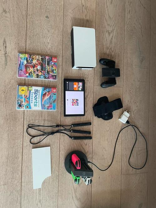 Nintendo Switch OLED, Spelcomputers en Games, Spelcomputers | Nintendo Wii U, Zo goed als nieuw, Met 3 controllers of meer, Met games