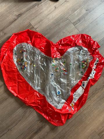 Floatie hart confetti beschikbaar voor biedingen