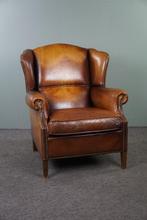 Schapenleren oorfauteuil met een prachtig patina, Huis en Inrichting, Fauteuils, 75 tot 100 cm, Gebruikt, Leer, 75 tot 100 cm