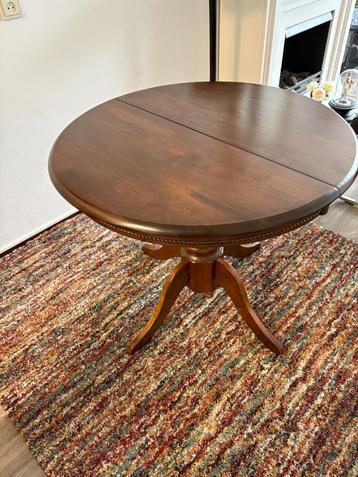 Ronde mahonie houten (uittrek) tafel beschikbaar voor biedingen