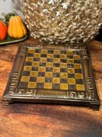 Souvenir s.a handmade of massive bronze schaakbord schaken, Huis en Inrichting, Ophalen of Verzenden, Gebruikt, Vierkant, Overige materialen