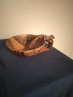 afrikaans houtsnijwerk, Ophalen