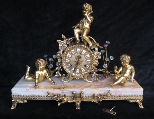 Magnifieke schouwklok met cherubs op zware onyx, Antiek en Kunst, Antiek | Klokken, Ophalen