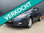 Kia Cee'd Sporty Wagon 1.4 CVVT Seven (12 mnd BOVAG-garantie, Stof, Gebruikt, Zwart, 4 cilinders