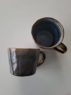 2 grijze met gouden oor mokken Xenos nieuwstaat, Nieuw, Ophalen of Verzenden, Overige stijlen, Kop(pen) en/of Schotel(s)