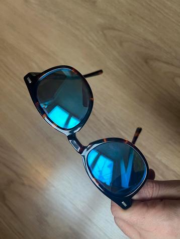 Zonnebril blauwe weerspiegeling - Lentes&Marcos 