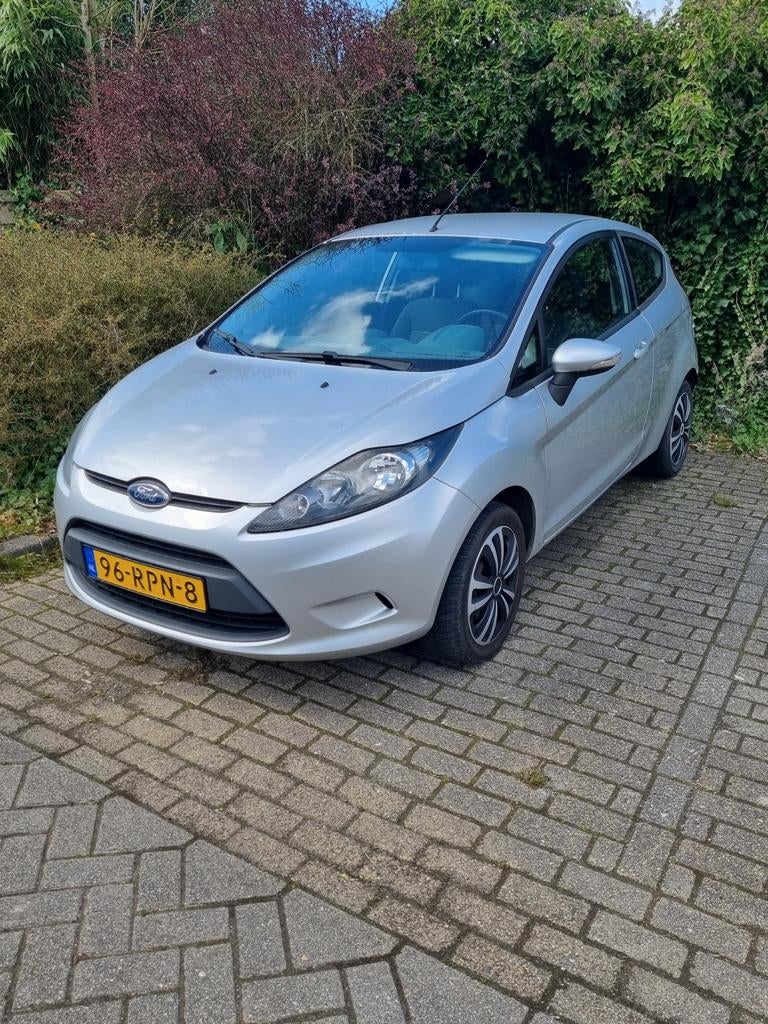 Ford Fiësta 1.25 44KW 3DR 2011 Grijs, Voorwielaandrijving, Euro 5, Stof, 4 cilinders