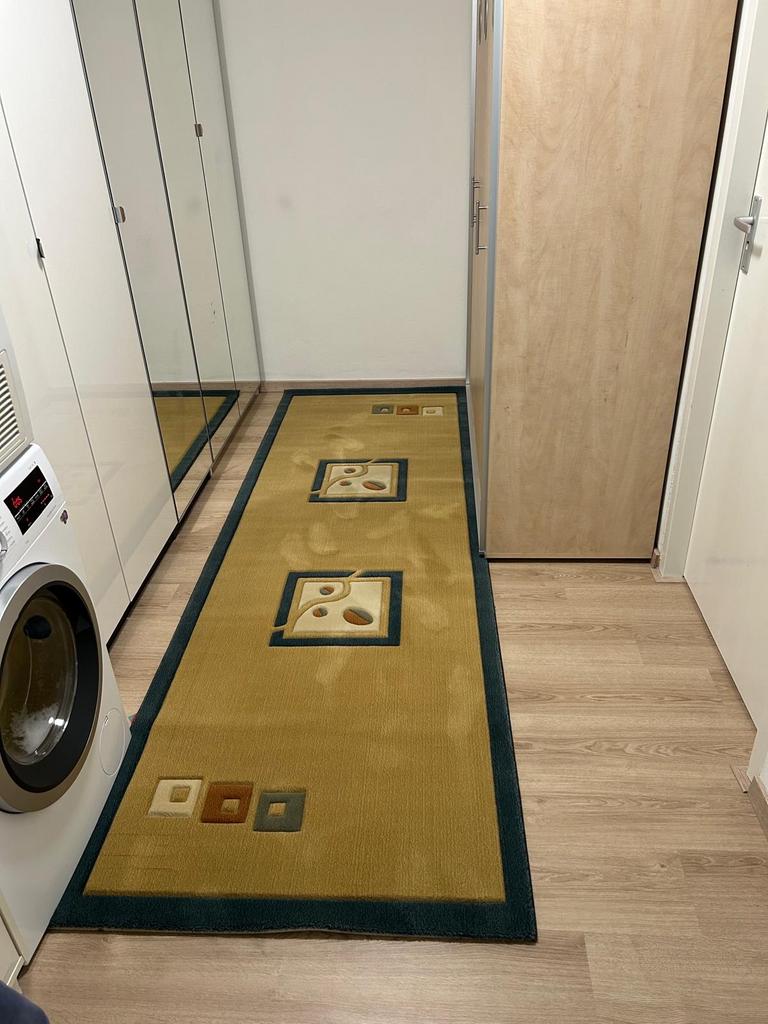 Langwerpig kleed met patronen, Huis en Inrichting, Gebruikt, Bruin, 200 cm of meer, Rechthoekig