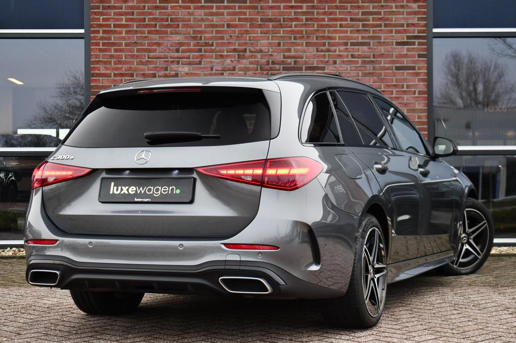 Mercedes-Benz C-Klasse Estate 300 e AMG Line Pano Trekh Dist, Auto's, Automaat, 12 maanden, Zwart, 4 cilinders
