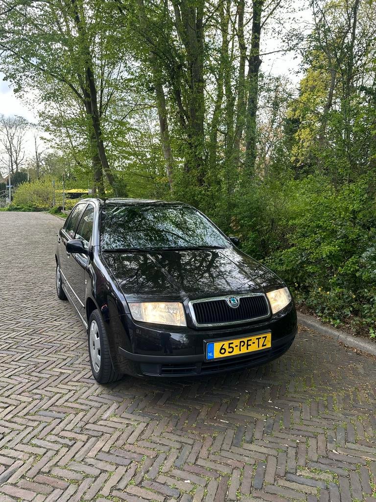 Skoda Fabia 1.4 Combi 55KW 2004 Zwart, Auto's, Voorwielaandrijving, 4 cilinders, Zwart, Origineel Nederlands