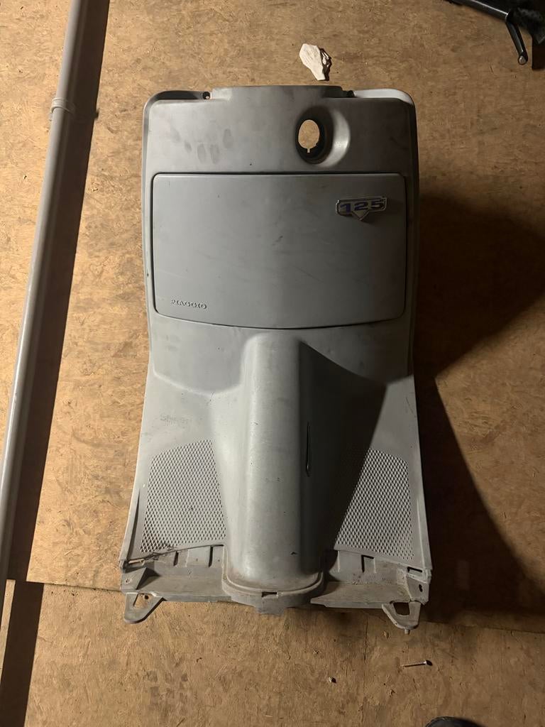 Piaggio SKR 125 beenschild kap, Ophalen of Verzenden