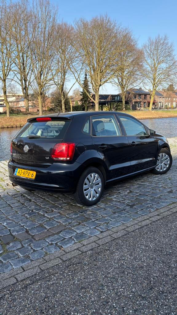 Volkswagen Polo 1.4 16V FSI COMFORTLINE 2011 Zwart, Auto's, Volkswagen, Voorwielaandrijving, 970 kg, 40 €/maand, 4 cilinders