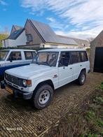 Mitsubishi pajero mk1 1989 Wit lwb, Auto's, Mitsubishi, Wit, 1695 kg, Particulier, Geïmporteerd