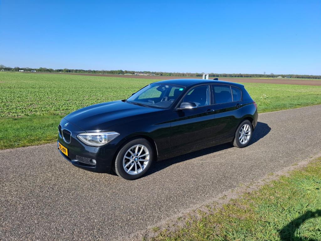BMW 118i (F20) Xenon | Cruise | Navi | Airco | 170 pk | NL, Auto's, BMW, 1-Serie, 1280 kg, 4 cilinders, Zwart