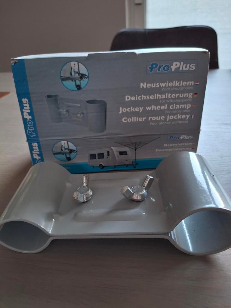 Neuswielklem voor droogmolen, Ophalen