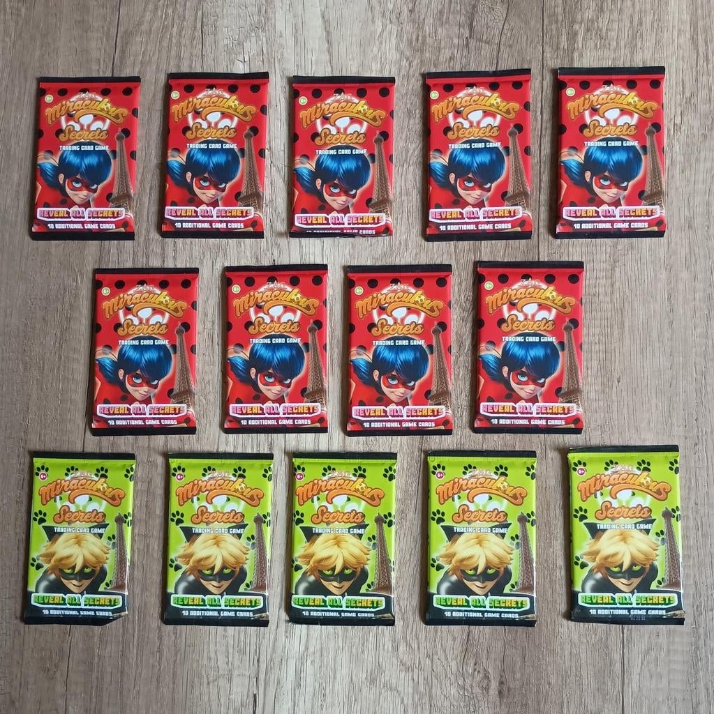 14 packs Miraculous Secrets - Ladybug & Cait Noir - SALE!!!!, Ophalen of Verzenden, Nieuw, Foil