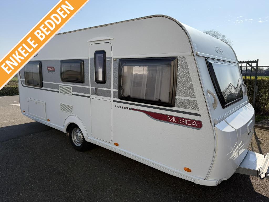 LMC Musica 490 E - Mover - Enkele bedden, Caravans en Kamperen, Rondzit, Bedrijf, Schokbreker, 4 tot 5 meter