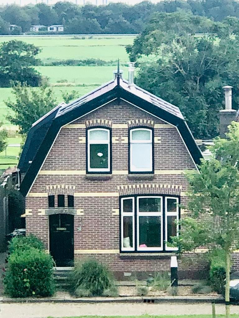 Half vrijstaande woning met een grote tuin op Wieringen., Huizen en Kamers, Huizen te koop, 120 m², 500 tot 1000 m², Vrijstaande woning