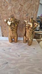 2 gouden torso's, Ophalen