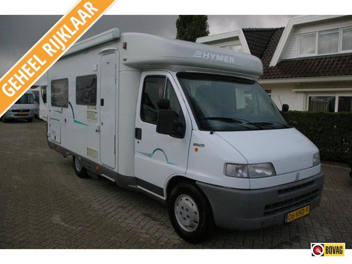 Hymer T 574 Fransbed, 2x draaistoelen, Motor en dak airco., Caravans en Kamperen, Campers, tot en met 2, Half-integraal, Hymer